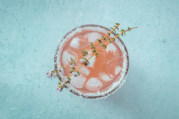 istock Salty Dog cocktail with fresh grapefruit juice, lime juice, and thyme 2223218863