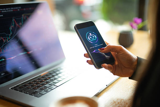 istock Asian woman using ai assist for analyzing crypto trading graph. 2223220547