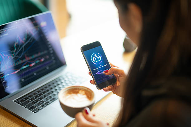 istock Asian woman using ai assist for analyzing crypto trading graph. 2223220560