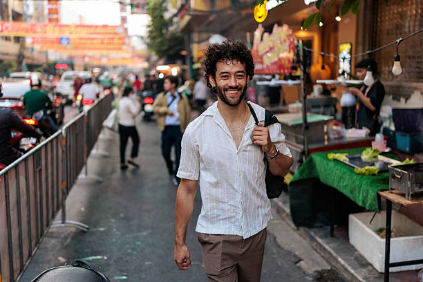 istock Handsome man casually walking in Bangkok 2223220845