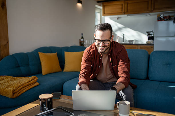istock Freelancer working from home on laptop and smiling 2223222245