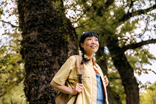 istock Casually dressed woman enjoying day in nature 2223223420