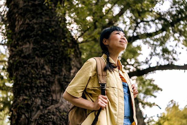 istock Casually dressed woman enjoying day in nature 2223223424