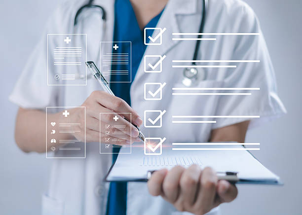 istock Patient data recording by medical professionals using diagnostics, hospital record systems, health platforms, medical coverage and online patient coverage support. 2223224099