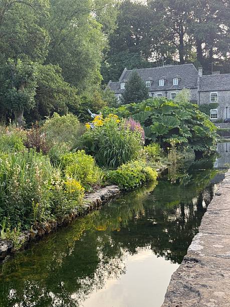 istock Reflections In The River Coln, Bibury, England 2223225007