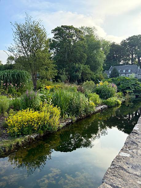 istock Reflections In The River Coln, Bibury, England 2223225072