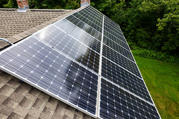 istock Residential Solar Panel Installation on Asphalt Shingle Roof 2223225093