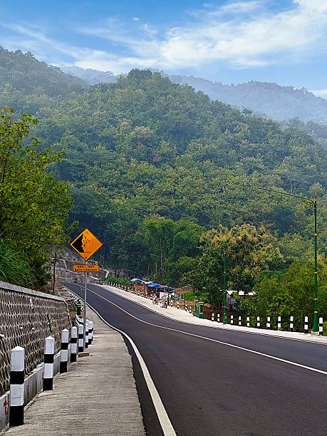 istock Landslide hazard signs on hilly downhill roads 2223226205