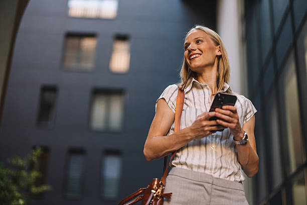 istock Confident Young Woman Smiling in Urban Setting 2223229059
