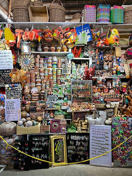 Cusco, Cusco Province, Peru- July 25, 2022: Handcrafted goods in a stall in a popular and busy Cusco marketplace.
