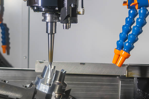 istock The 5-axis CNC milling machine finish cut the automotive part with solid ball nose end mill tool. 2223231205