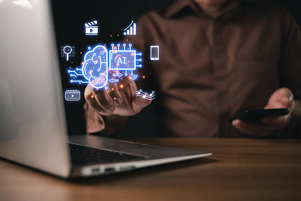 istock A businessman use futuristic AI power digital interface display artificial intelligence, machine learning, data analytics, automation, and media technology, symbol innovation and smart solutions. 2223233620