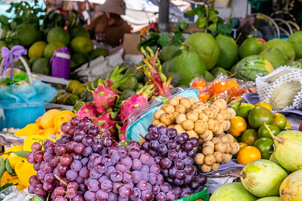 istock Colorful tropical fruit market display with grapes and exotic varieties 2223238604