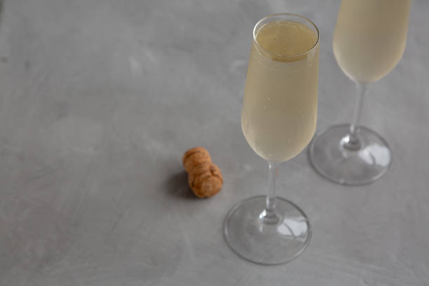 istock Cold Bubbly Champagne in a Glass on a gray background, side view. Copy space. 2223242027
