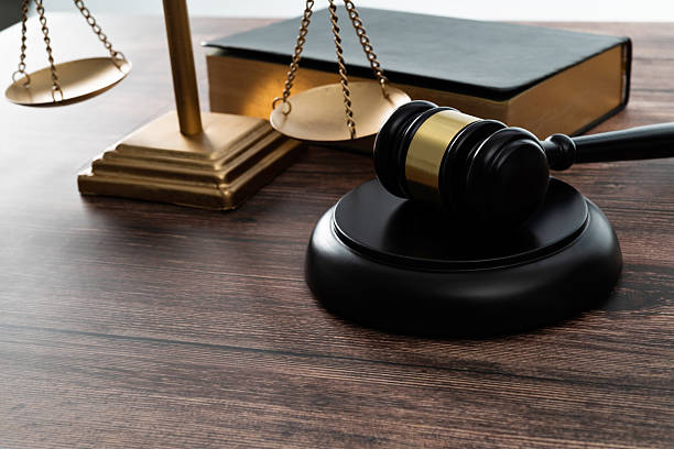 istock Gavel and scales of justice on the table 2223242100