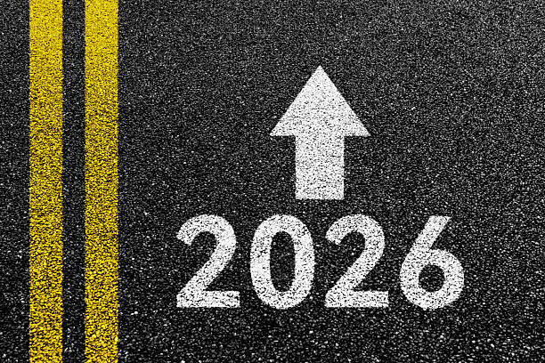 istock New year number 2026 with white arrow on asphalt road 2223242474