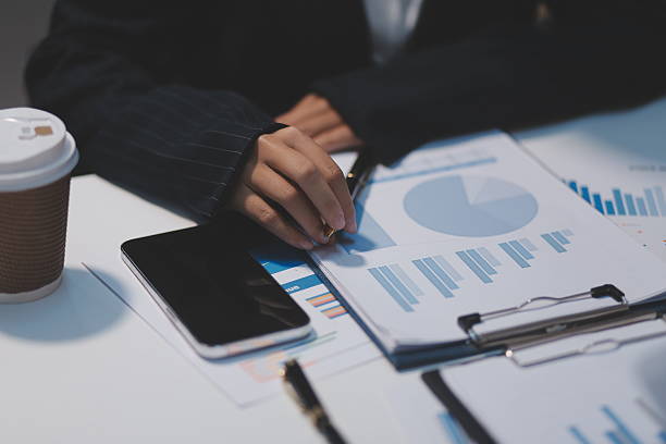istock Close up of Business team analyzing income charts and graphs with modern laptop computer. Business analysis and strategy concept. 2223247465