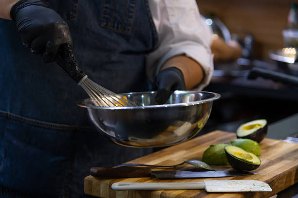istock Chef prepares fresh ingredients for appetizers in a bustling kitchen 2223256484