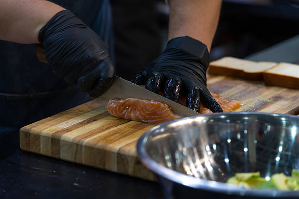 istock Preparing fresh salmon fillet with precision for a delicious appetizer 2223256559