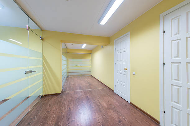 istock Modern Office Interior Space With Yellow Walls and Glass Partition 2223257707