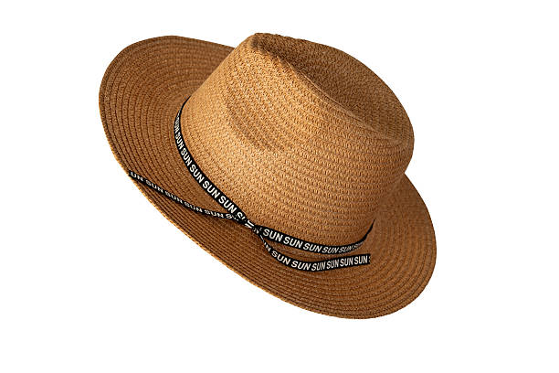 istock Women's straw sun hat for beach vacation on white background with space for text. Accessories and beach vacation concept. 2223259186