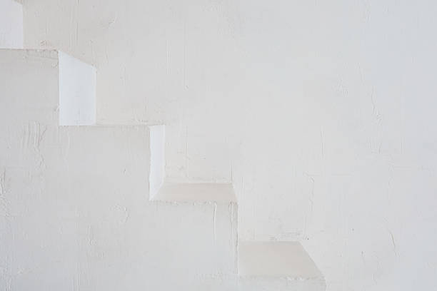 White Textured Staircase in a Minimalist Interior