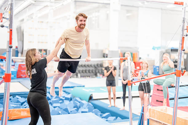istock Gymnastics Training Session With Coach and Learners in Athletic Facility 2223263676
