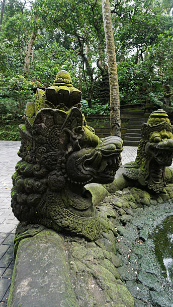 istock Statue at Ubud Monkey Forest - a sanctuary which is home to three Hindu temples Padangtegal, Ubud, Bali, Indonesia 2223264815