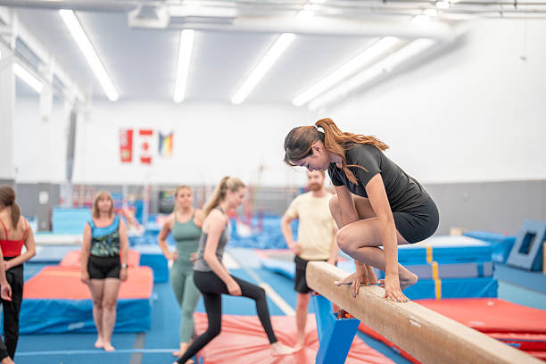 istock Gymnastics Training Team Practicing Skills at Indoor Gym Facility 2223265705