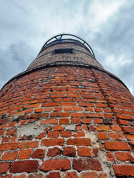 Brick tower view from bottom up to sky