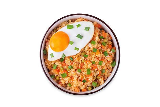 istock Vegetables fried rice with fried eggs, asian food on a white isolated background 2223267419