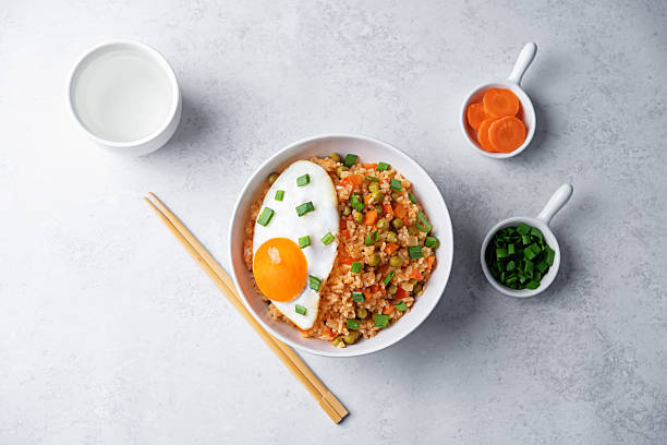 istock Vegetables fried rice with fried eggs, asian food 2223267432