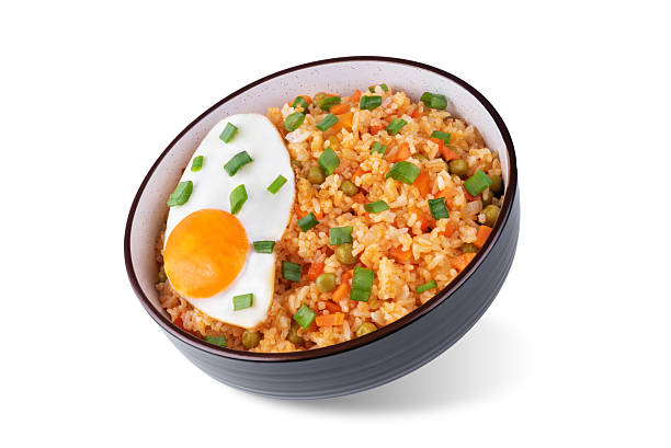 istock Vegetables fried rice with fried eggs, asian food on a white isolated background 2223267453