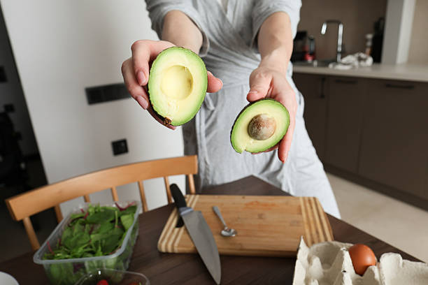 istock Preparing Healthy Breakfast with Avocado and Herbal Tea 2223270087