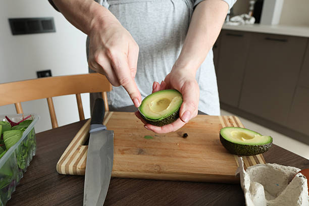 istock Preparing Healthy Breakfast with Avocado and Herbal Tea 2223270147