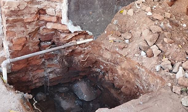 istock Hole dug to remove water leak. 2223270588