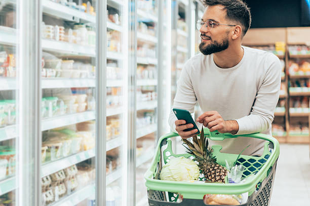istock Handsome man shopping in supermarket 2223272863