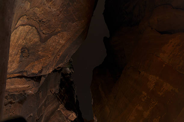 istock Narrow canyon with night sky 2223275600