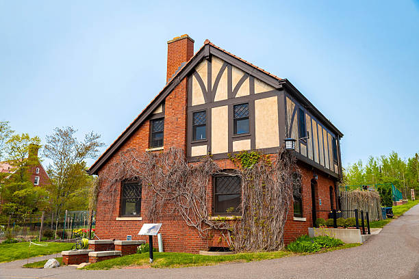 Duluth, MN, USA - June 27, 2025: Charming view of the Gardeners Cottage at Glensheen Mansion, capturing the historic beauty and architectural detail of this estate