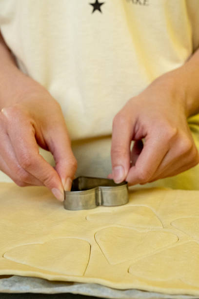 istock Process of making homemade cookies made by a special cookie cutter 2223280990