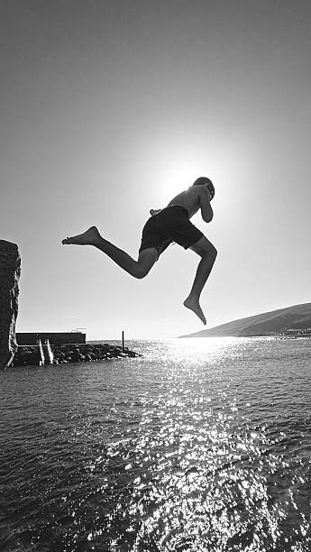 istock Jumping to the sea 2223281554