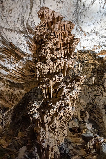 istock Large stalagmite formation rising from cave floor 2223284422