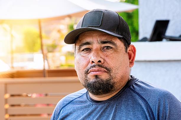 istock Headshot of a  mature Hispanic man posing looking at camera 2223289014