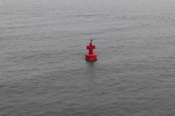 istock red navigation buoy at sea 2223290227