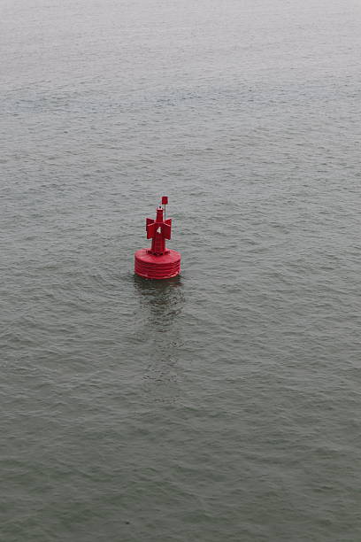 istock red navigation buoy at sea 2223290228