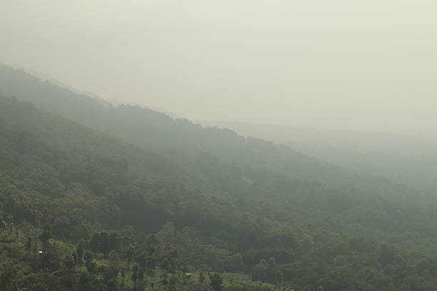 istock mountain landscape with thick clouds and fog around 2223291744