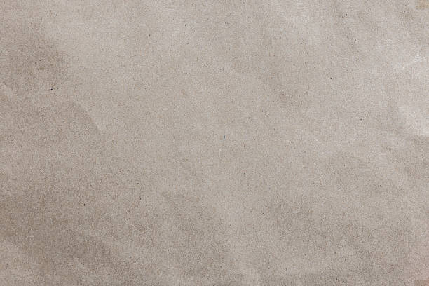 istock close up on crumpled brown paper background texture for ads design template or add content on display concept 2223300512