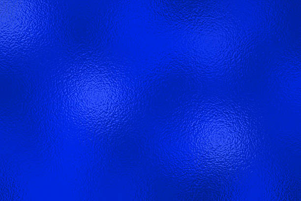 istock Blue Foil Texture Background with Glass Effect, Illustration. Abstract gradient bright and shiny light reflection rough texture 2223300763