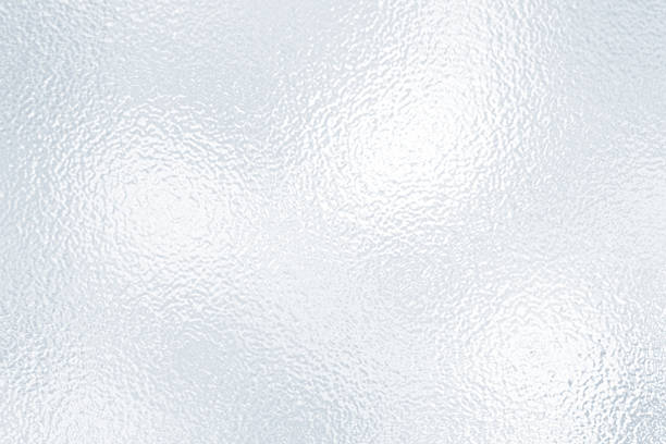 istock White gray foil glass texture background. Abstract gradient bright light reflection and shiny rough texture surface. Glass effect background 2223300890