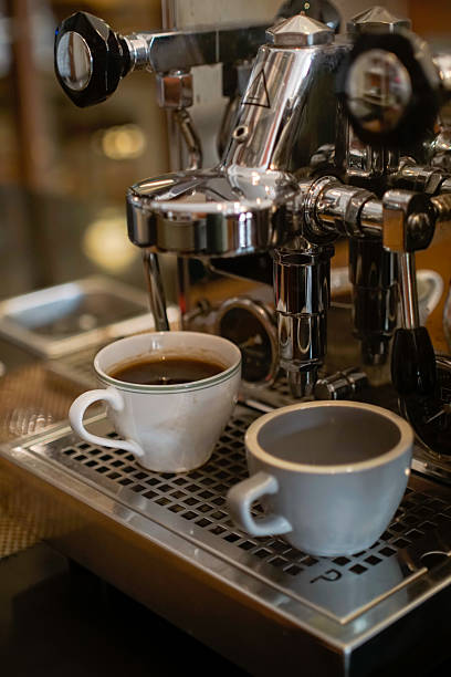 istock Cup of coffee on espresso machine 2223306760